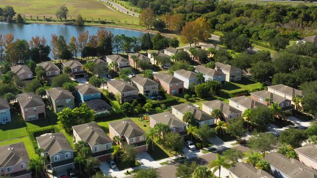Sarasota, Florida. Peaceful suburbs neighborhood with lakes nearby, next to highway. Aerial view
