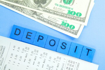 banknotes and receipts with the word deposit