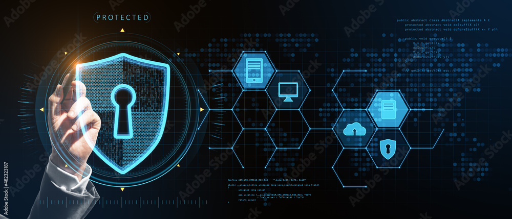 Aufkleber Close up of businessman hand pointing at abstract glowing keyhole shield interface on blurry background. Protection, safety and technology concept. Double exposure.