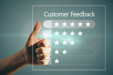 Close up of male hand pointing thumbs up at customer feedback hologram on blue background. Rating...