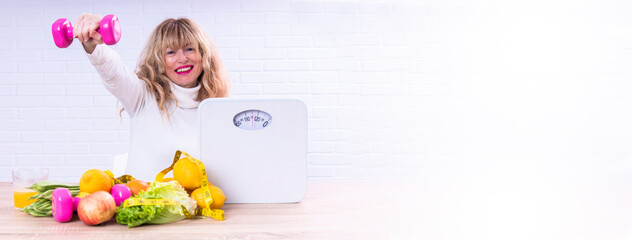 happy woman with dumbbells and healthy food. healthy diet and sport concept