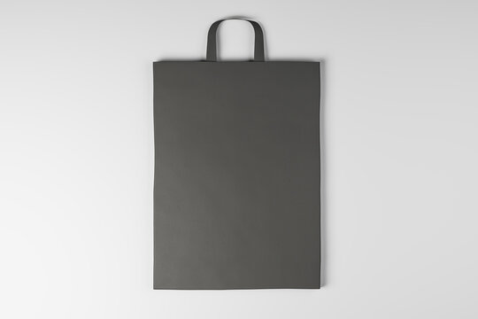 Close up of empty paper bag on white background. Mock up place for your advertisement or logo. 3D Rendering.