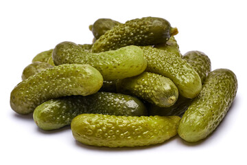 Pile of of Tasty canned Whole green cornichons isolated on a white background