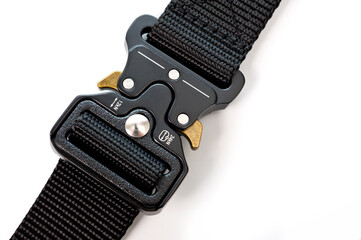 Black belt for clothes and trousers with a metal automatic fastener.