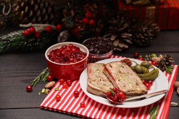 Portion of Traditional French terrine covered with bacon and decorated Christmas tree