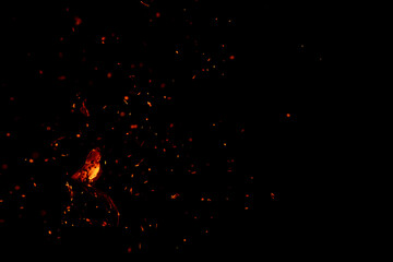 flame fire with sparks on black background