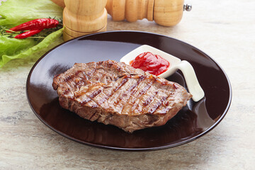 Grilled rib-eye steak beef meat