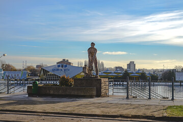 Sculpture on the waterfront in Szczecin, Poland. Opposite the sculpture is the railway station.
