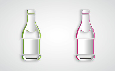 Paper cut Champagne bottle icon isolated on grey background. Merry Christmas and Happy New Year. Paper art style. Vector