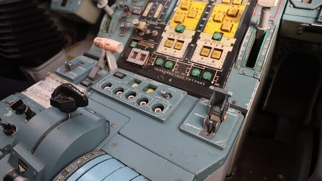 Central control panel with sensors, indicators, levers and toggle switches of the Russian Tu-160 strategic missile carrier. Full hd.120 fps