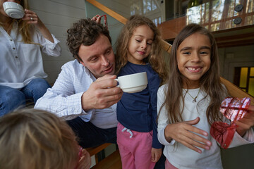 Happy brunette girl demonstrating her smile on camera