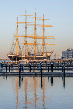 Germany, Schleswig-Holstein, Lubeck, Barque Passat docked in harbor at dusk