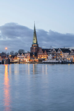 Germany, Schleswig-Holstein, Lubeck, Skyline of Travemunde at dusk