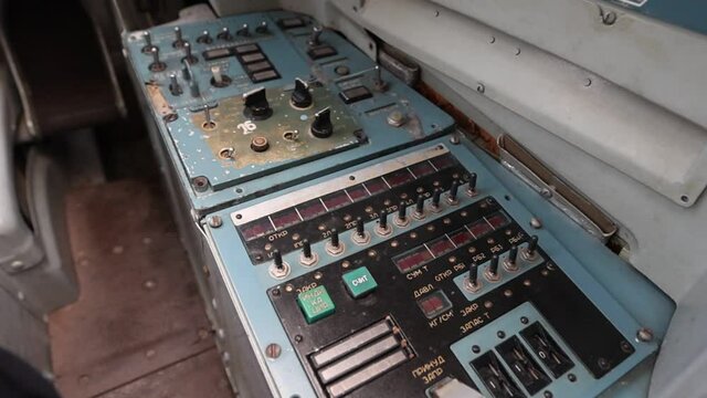 Side control panel from the side of the co-pilot with sensors, indicators, levers and toggle switches of the Russian Tu-160 strategic missile carrier. Full hd.120 fps