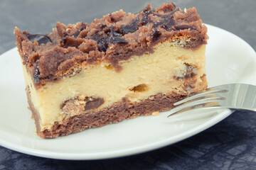 Piece of fresh cheesecake on plate. Delicious dessert