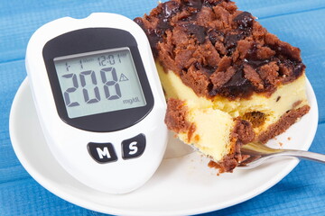 Glucometer for checking sugar level and fresh baked cheesecake. Diabetes and dieting during diabetes
