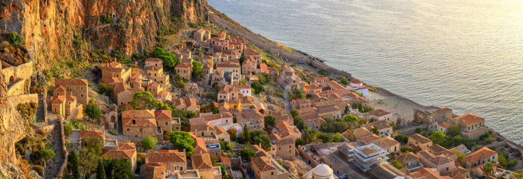 picturesque parorama old medieval castle town of Monemvasia in Lakonia at sunrise, Peloponnese, Greece. "Greek Gibraltar"