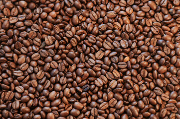 Close view of roasted coffee beans ready to be ground and infuse