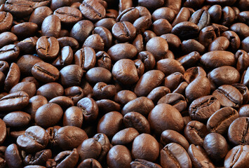 Close view of roasted coffee beans ready to be ground and infuse