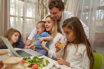Bored curly-haired girl leaning on the table