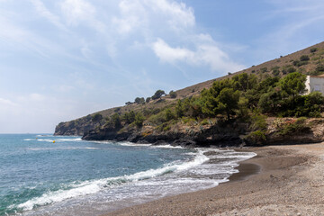 deserted cove in roses a sunny summer day