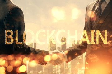 Double exposure of blockchain hologram and handshake of two men. Crypto business concept.