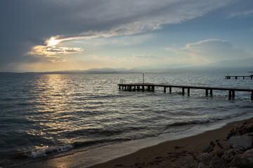 Fototapeta na wymiar Sunset in Lazise on Lake Garda, Italy