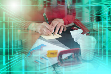 Businesswoman working on a messy desk; multiple exposure