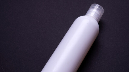 hand cream packaging on black background