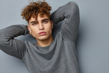 handsome young man sexy posing self confidence isolated background