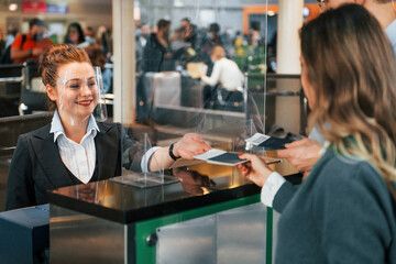Professional service. Young couple is in the airport together