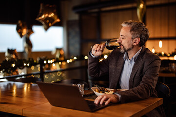 Lovely bearded caucasian restasurant owner, coming up with a new menu, at work.