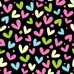 Seamless pattern with hearts on a black background.
