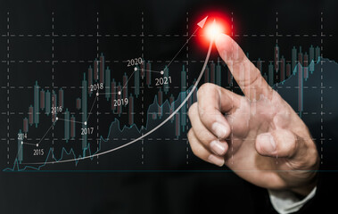 Planning and strategy, stock market, business growth, progress, or successful ideas. A businessman...