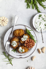 Obraz na płótnie Canvas Baked potatoes with rosemary and garlic.