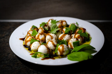 healthy eating, buffalo mozzarella in olive oil and balsamic vinegar and basil