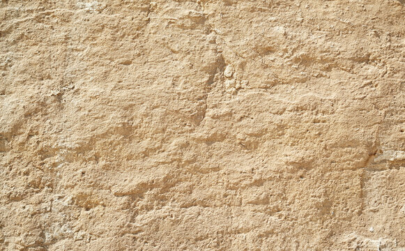 Natural texture sandstone, sun lighting, stone background