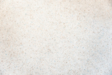 light background mottled with turquoise and beige sparkles