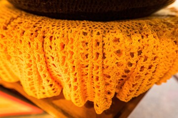 fabric orange knitted texture background with scarf clothing