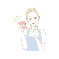 通帳残高を確認する主婦