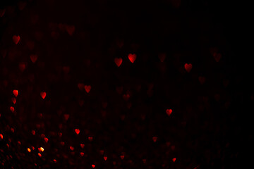 Red hearts, sparkling glitter bokeh background, valentines day abstract defocused texture