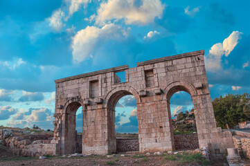 Fototapeta na wymiar Patara ancient city gate with cloudy sky