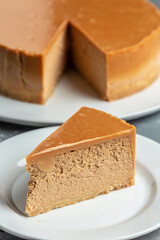 Tasty homemade caramel cheesecake, Piece of delicious cake with caramel, Cheesecake with caramel sauce