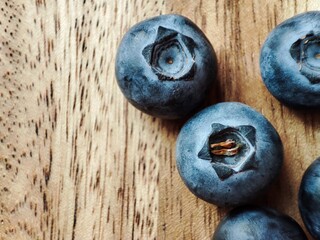 blueberries on wooden background