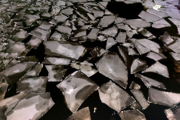 Drifting ice floes on river. ice drift on Moscow river © diy13