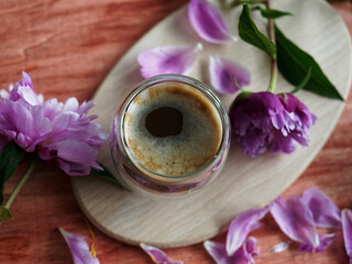 Table top, flat lay of coffee with peonies
