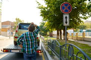 Worried driver having improper parking rule violation - obrazy, fototapety, plakaty