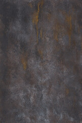 Black metallic texture with brown streaks. Dark iron cast iron sheet with patina and rust.