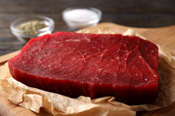 Concept of tasty food with raw beef steak, close up