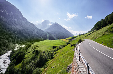 Asphalt road in Alp mountains. Road trip concept. Beautiful landscape. © Loginova